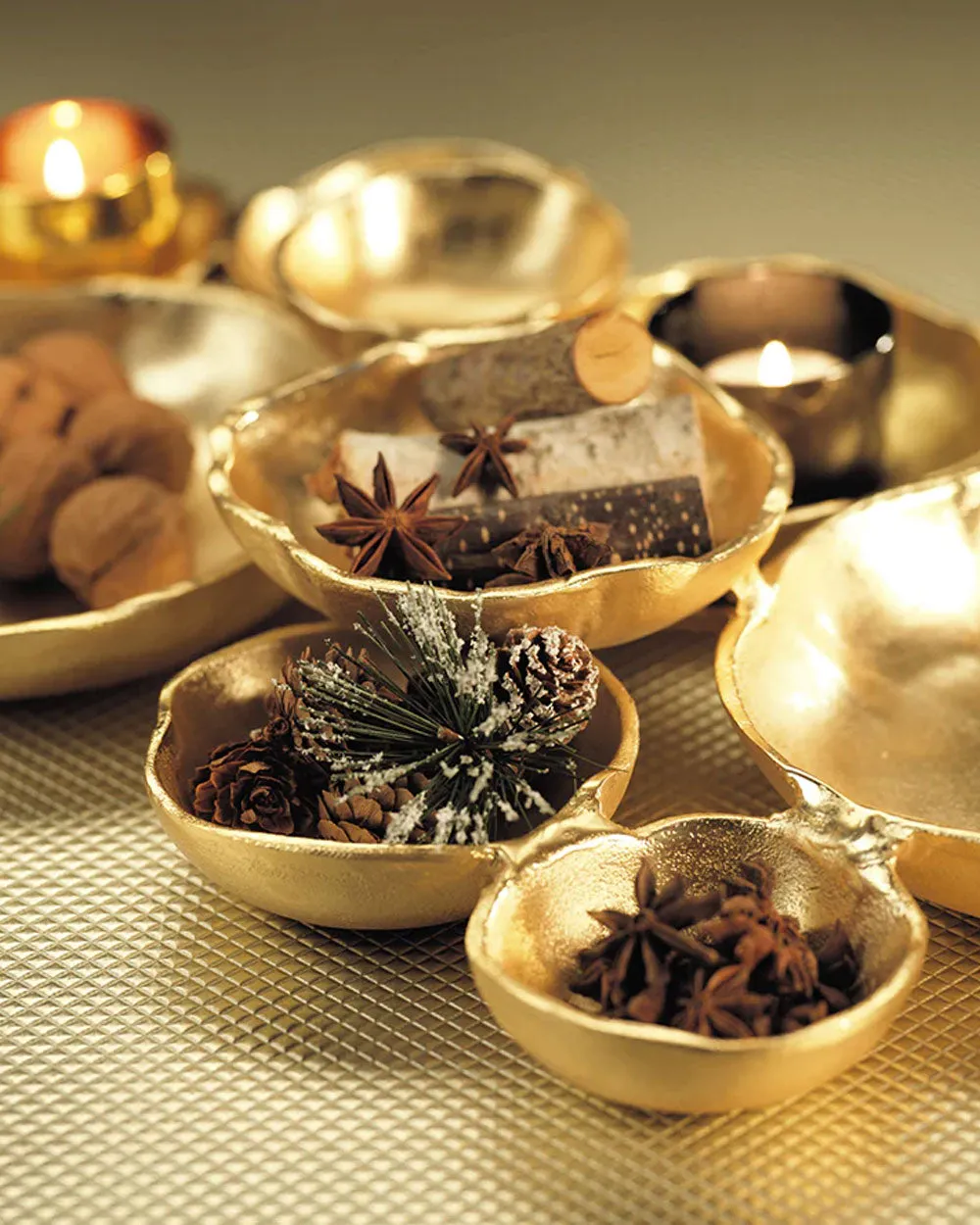 Cluster of Nine Serving Bowls in Gold